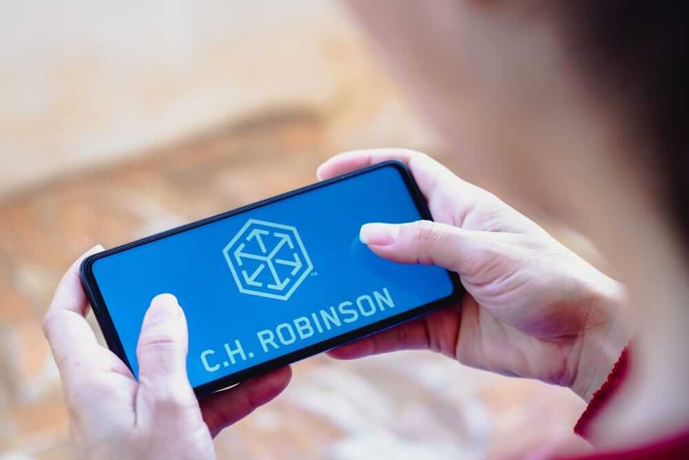 C_H_ Robinson Worldwide, Inc_logo on phone-by rafapress via Shutterstock